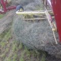 Hay Raking in field.