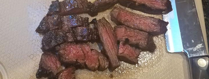 slices of grilled skirt steak.