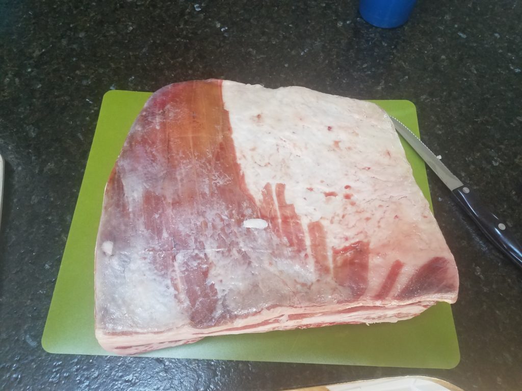 Raw slab of ribs.