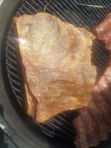 Ribs being slow-grilled.