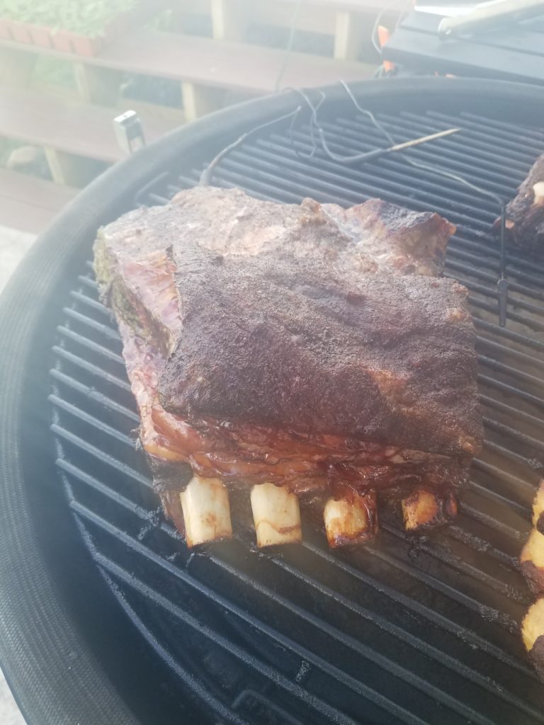 Ribs being tested for doneness.