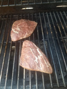 Steaks starting to cook.