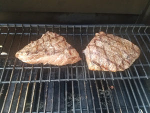 Steaks cooked on one side.