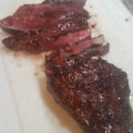 Glazed steaks sliced against the grain for maximum tenderness.