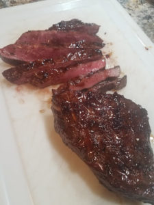 Glazed steaks sliced against the grain for maximum tenderness.